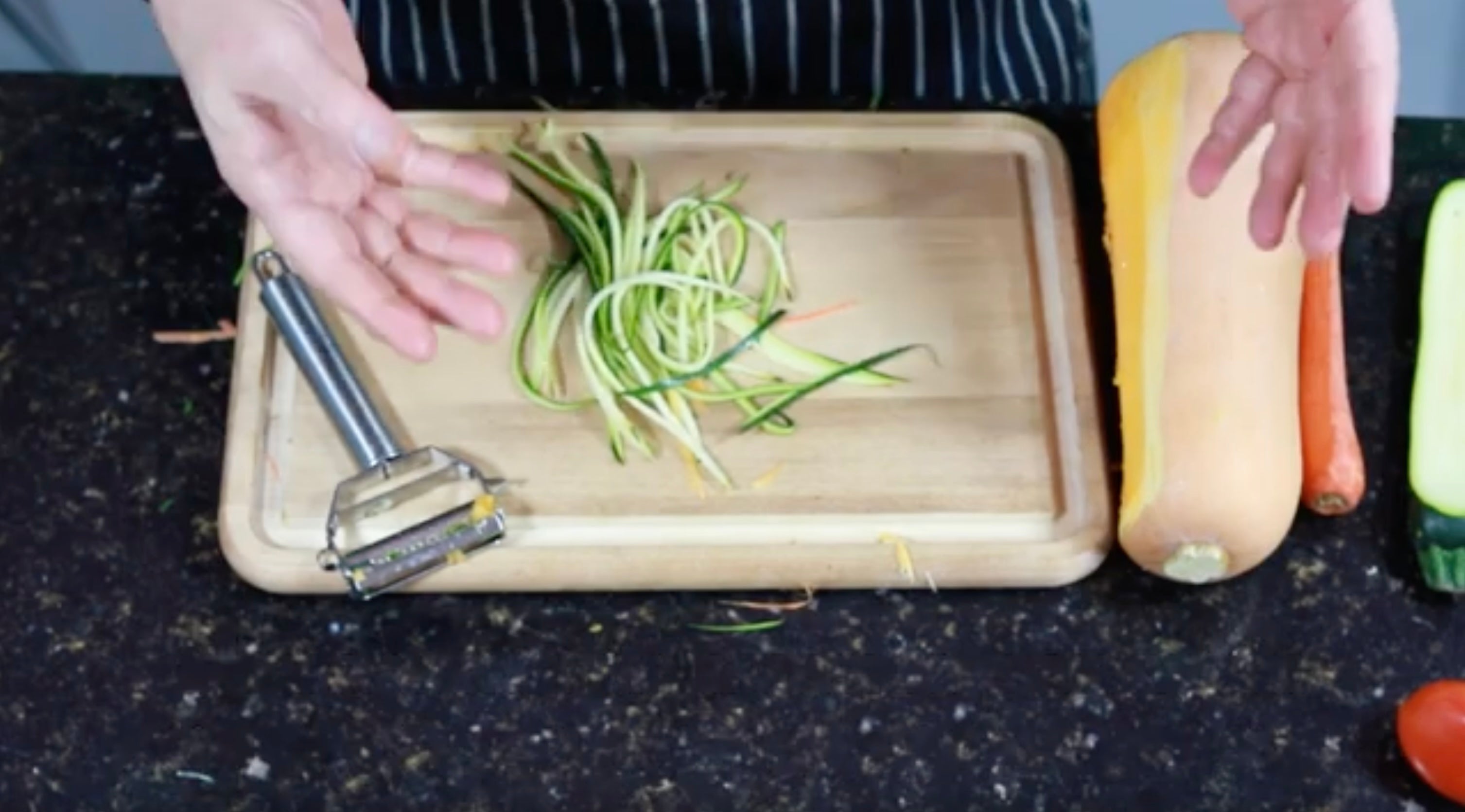 Load video: Learn to use the Kitchen Club spiralizer/peeler